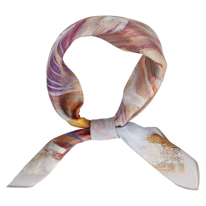 Colorful scarf tied in a knot on a white background